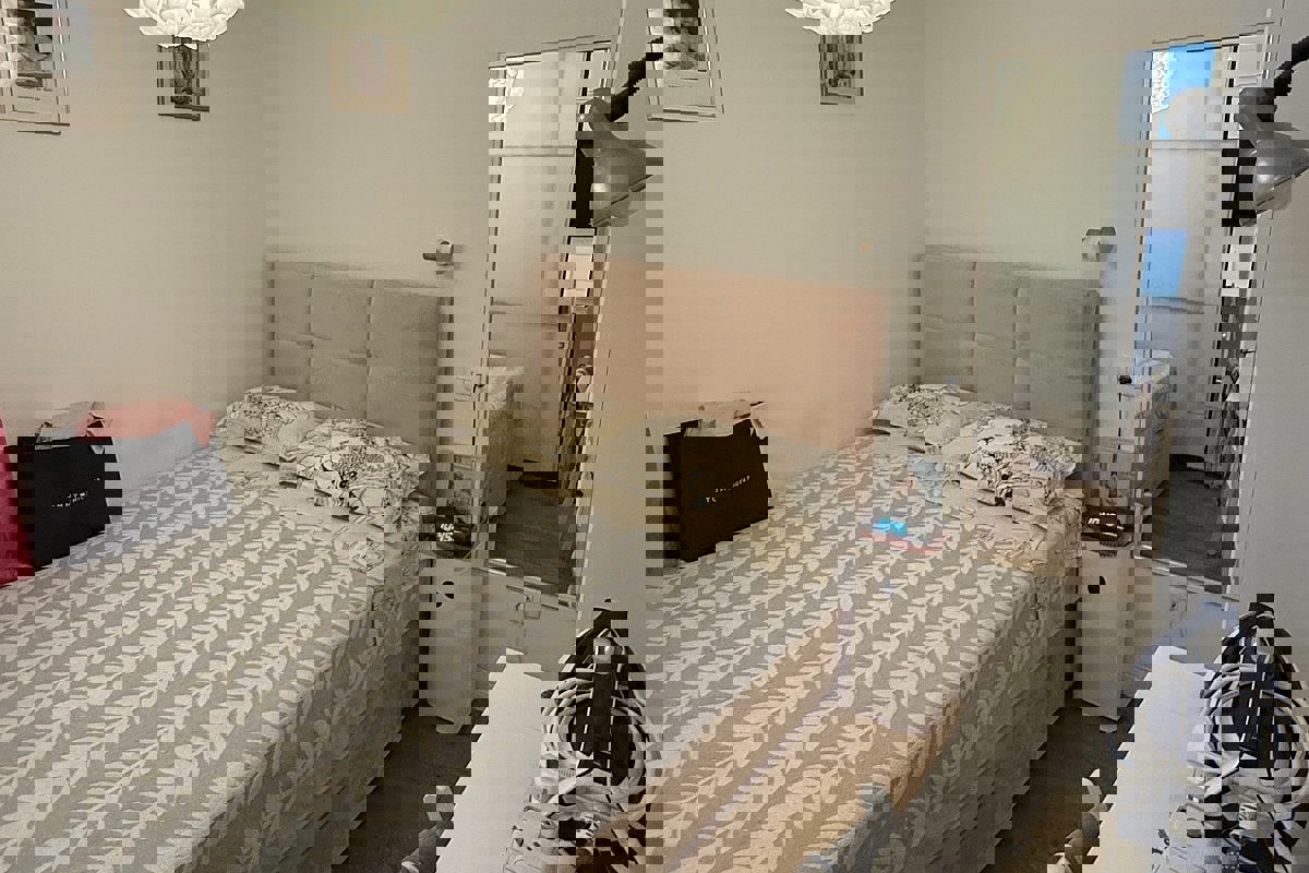 Appartamento con due camere da letto e monolocale completamente ristrutturati in centro città, ideali come residenza e investimento