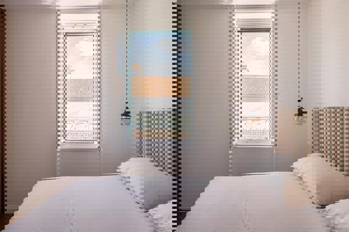 Appartamento con due camere da letto e monolocale completamente ristrutturati in centro città, ideali come residenza e investimento