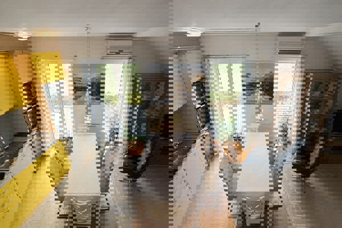 Appartamento duplex con posto auto