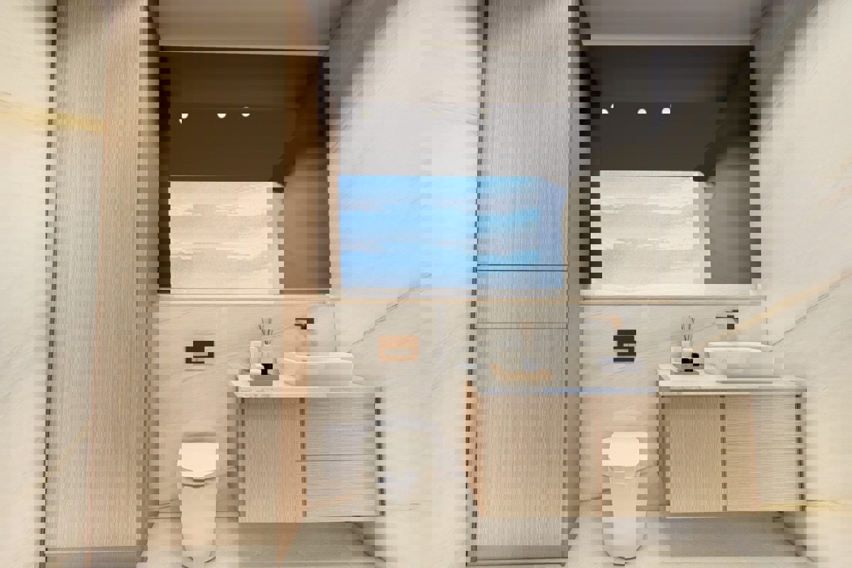 Attraente appartamento con due camere da letto in un edificio di nuova costruzione con vista parziale sul mare