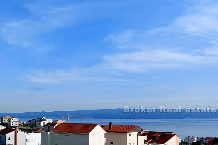 Casa bifamiliare con vista mare