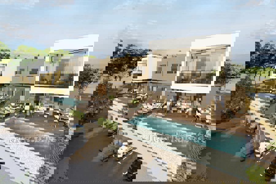 Villa moderna bifamiliare con vista mare