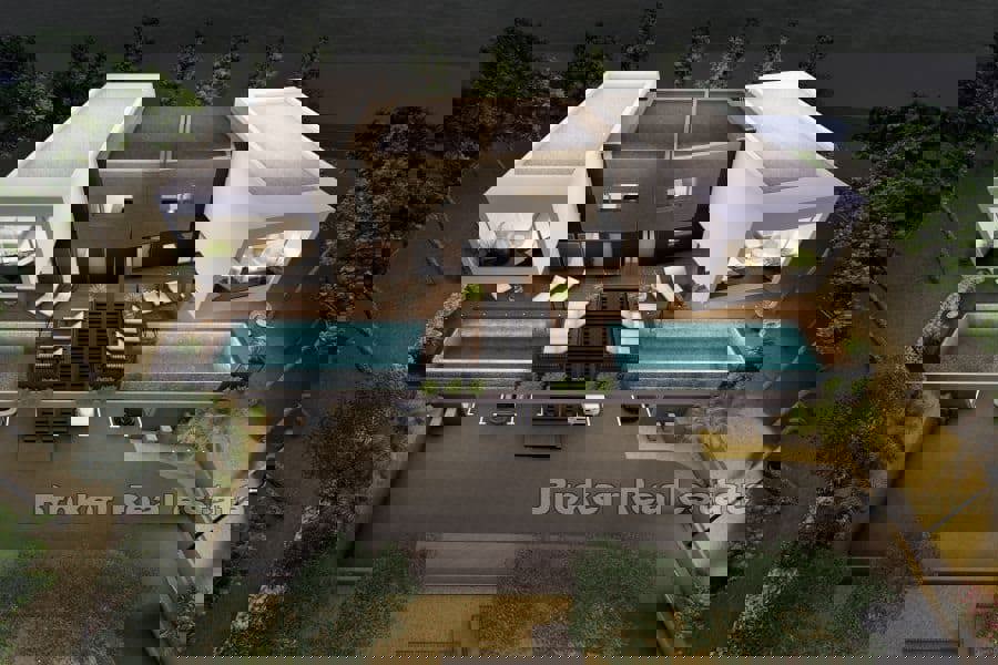 Villa moderna bifamiliare con vista mare