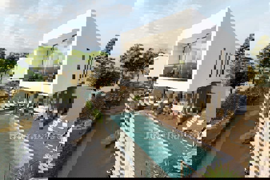 Villa moderna bifamiliare con vista mare