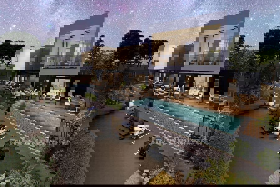 Villa moderna bifamiliare con vista mare