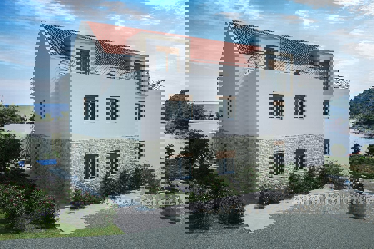 Appartamento con piscina e vista sul mare aperto