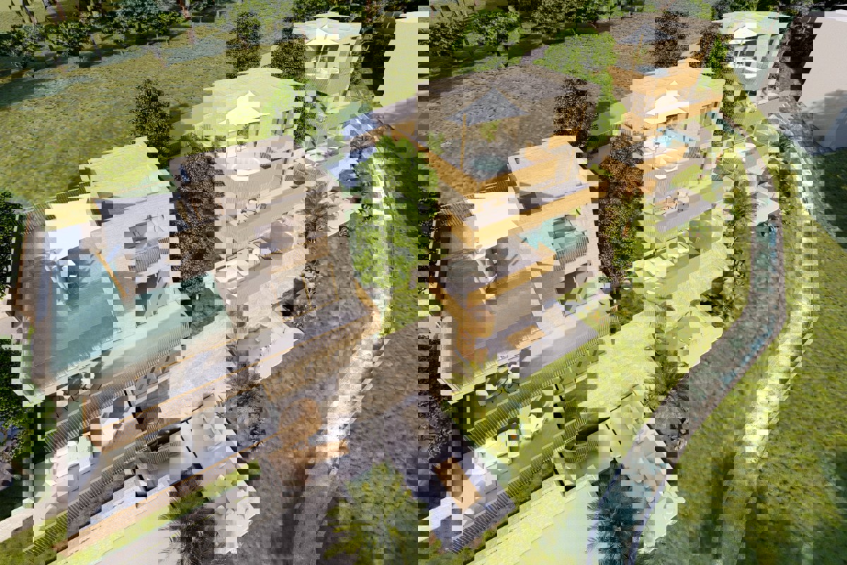 Terreno con progetto per tre ville moderne con vista