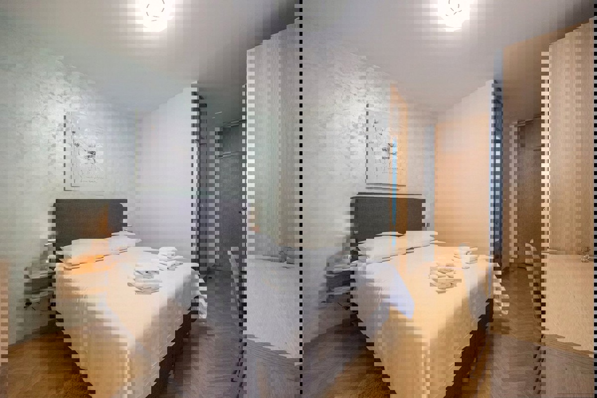 Appartamento arredato con tre camere da letto in posizione privilegiata