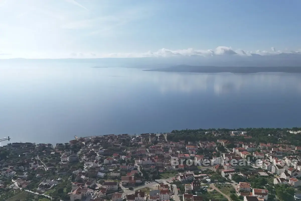 Terreno agricolo unico con un edificio e una splendida vista sul mare