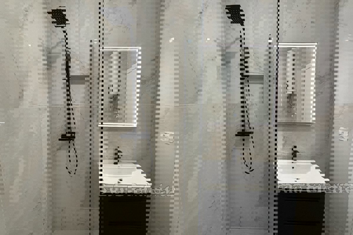 Attico moderno con vista mare