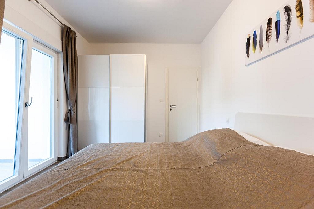 Moderno condominio in prima fila sul mare