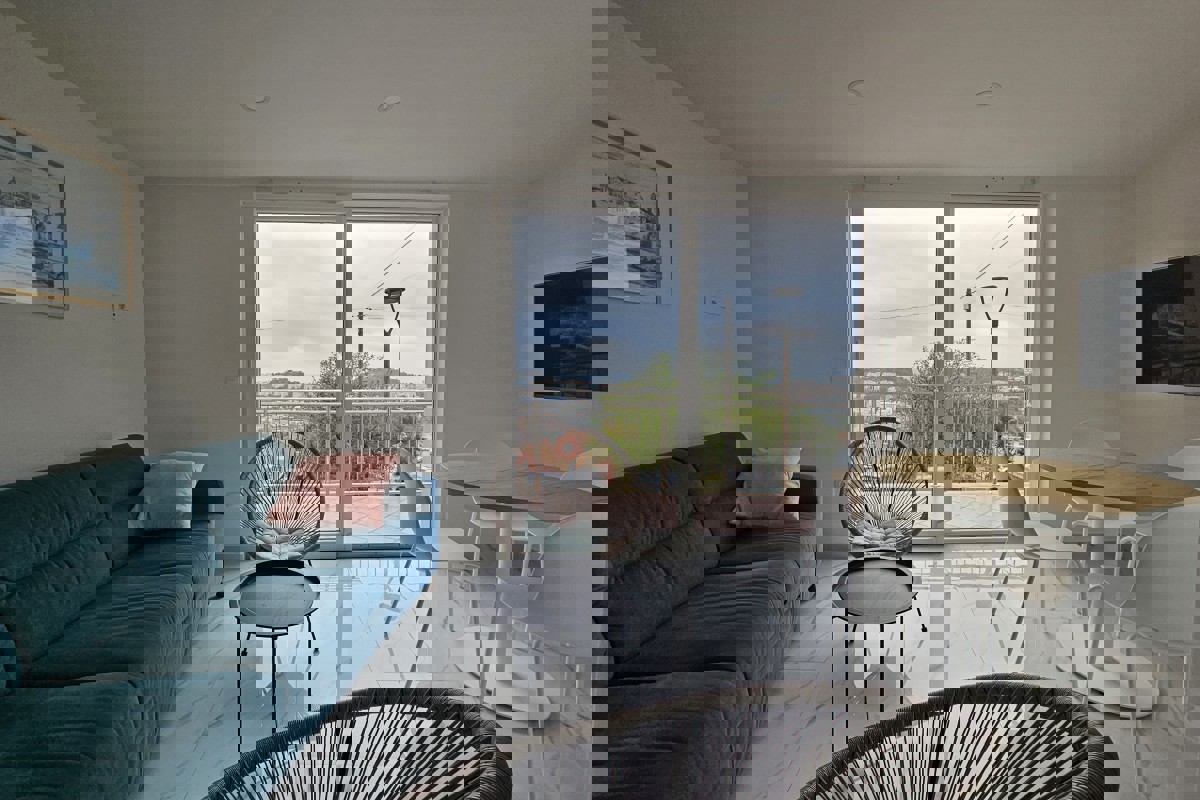 Casa con due appartamenti in posizione tranquilla