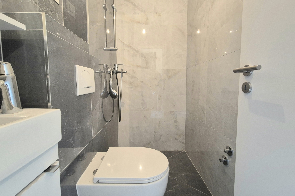 Attico con terrazza panoramica e posto auto