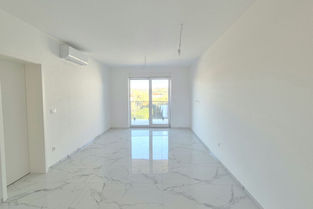 Attico con terrazza panoramica e posto auto