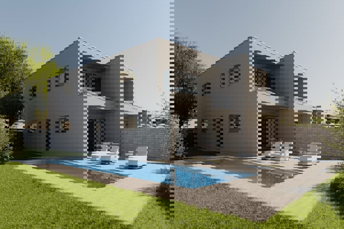 Moderna casa bifamiliare con piscina e vista mare