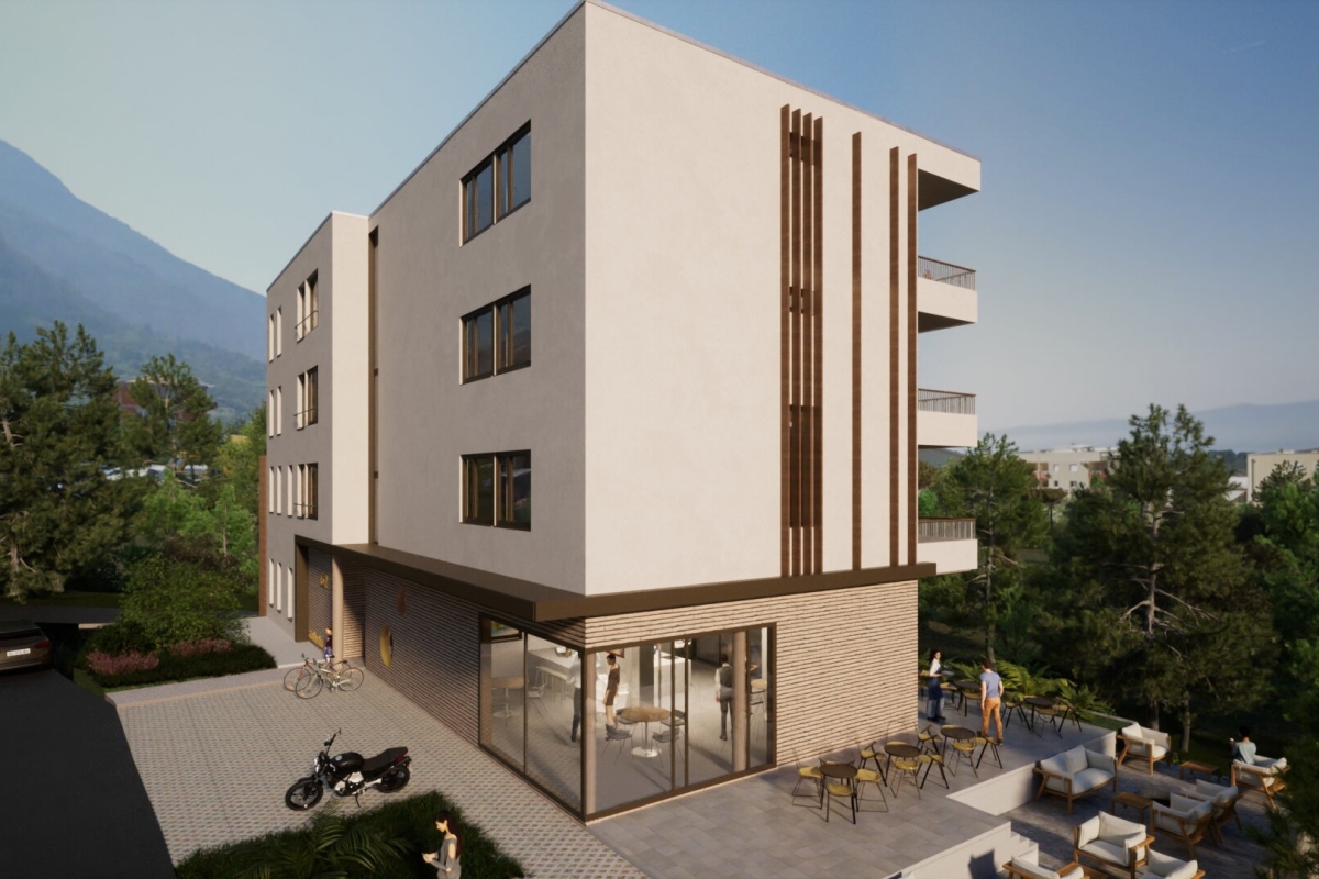 Moderno appartamento con tre camere da letto e balcone in un edificio di nuova costruzione