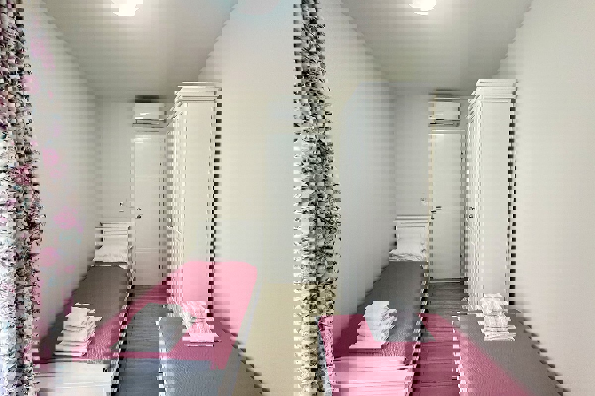 Appartamento con due camere da letto e posto auto