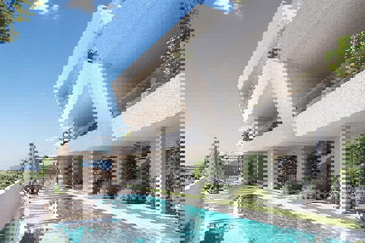 Appartamento con piscina e vista mare