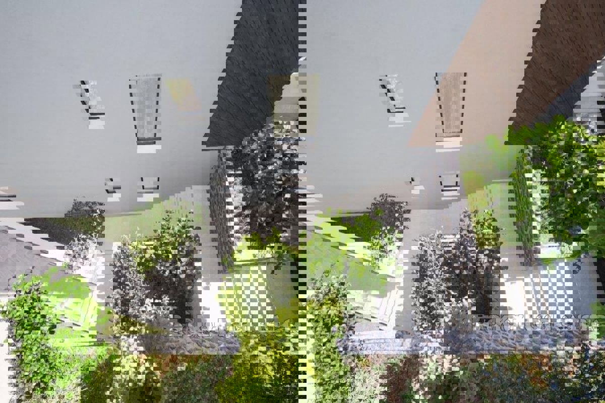 Interessante terreno edificabile con vista sulla baia