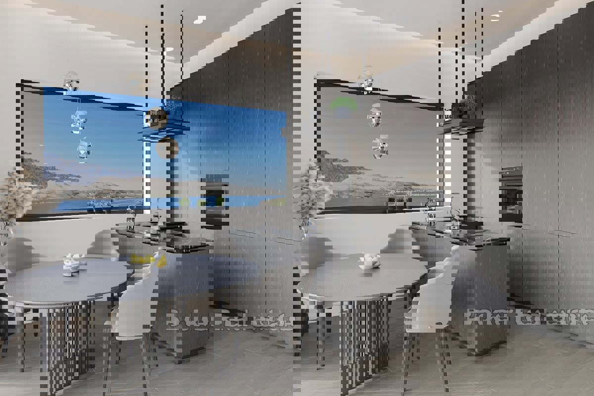 Appartamenti moderni in un nuovo edificio con piscina e vista sul mare