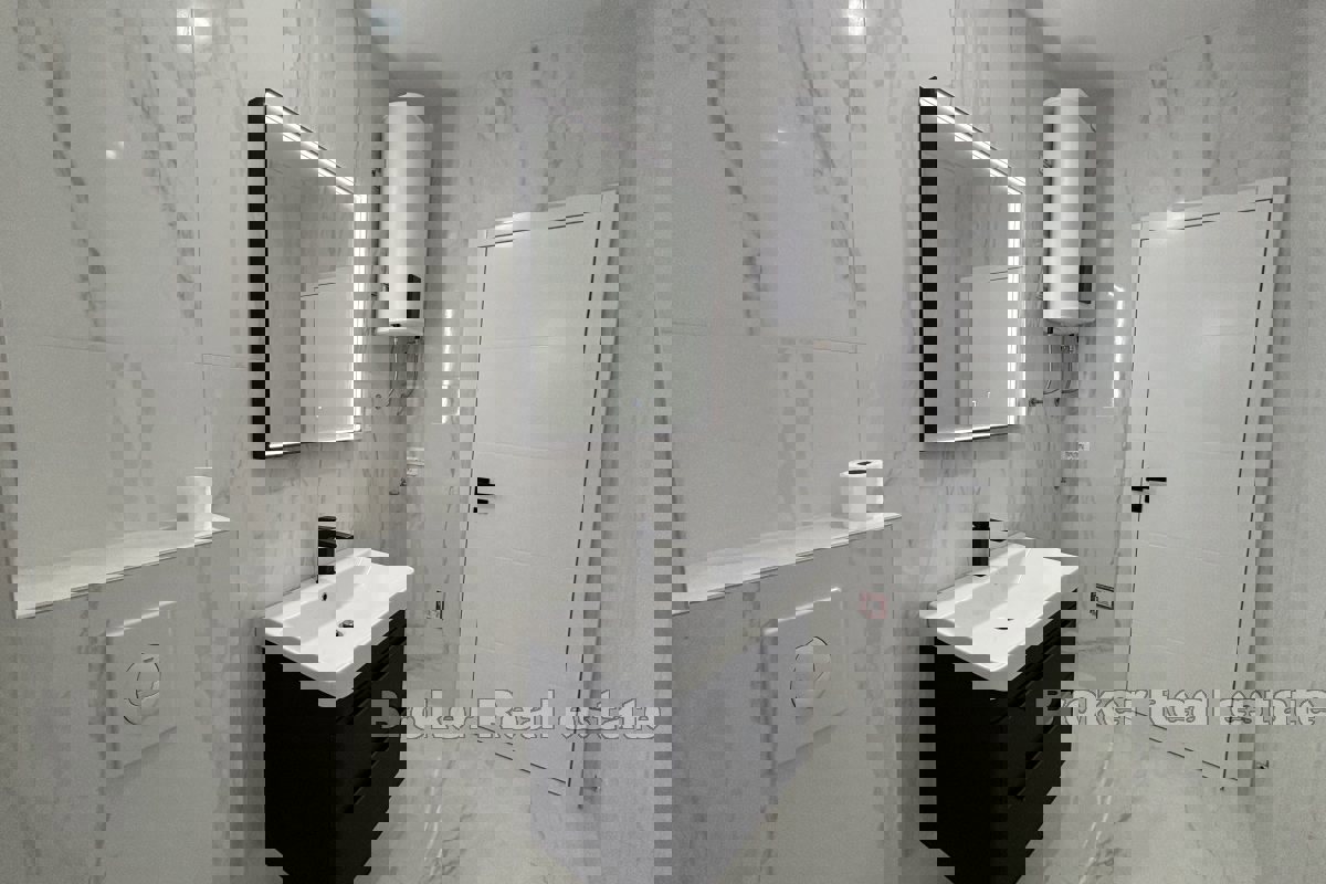 Spazioso attico con vista mare