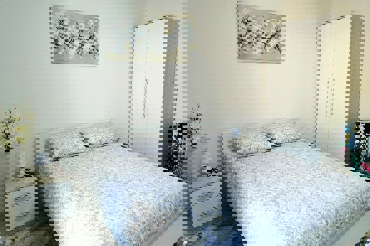 Casa bifamiliare in pietra sul lungomare