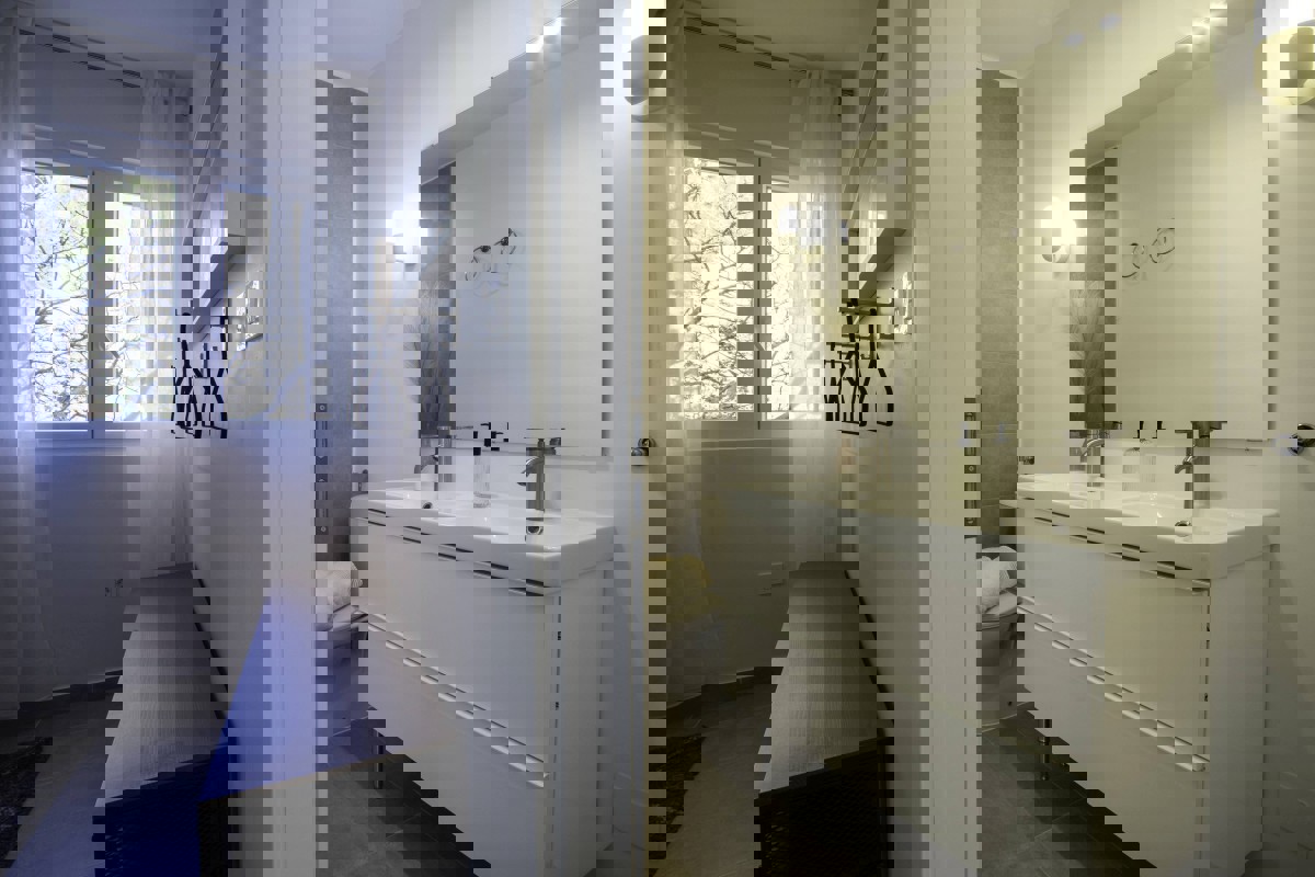 Attico con terrazza e vista mare