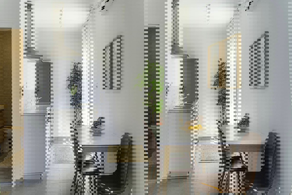 Attico con terrazza e vista mare