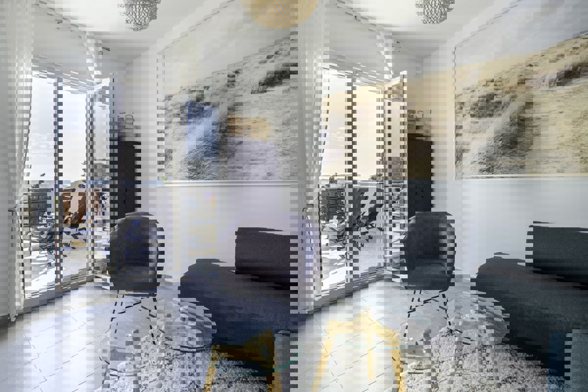 Attico con terrazza e vista mare