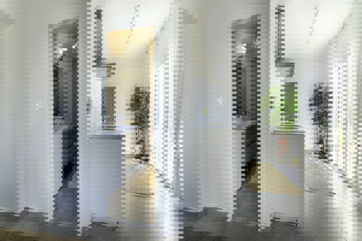 Attico con terrazza e vista mare