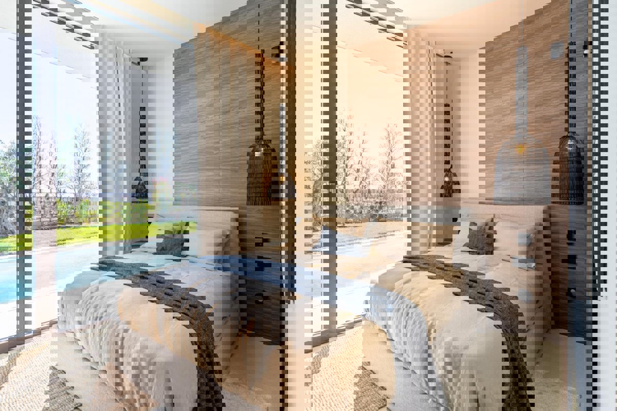 Villa su un unico piano con piscina e vista mare aperta