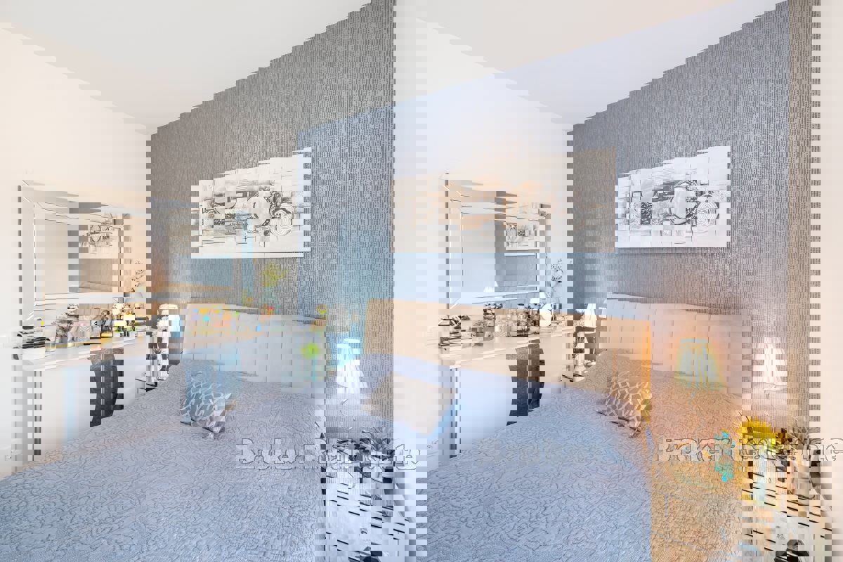 Bilocale in nuova palazzina con giardino