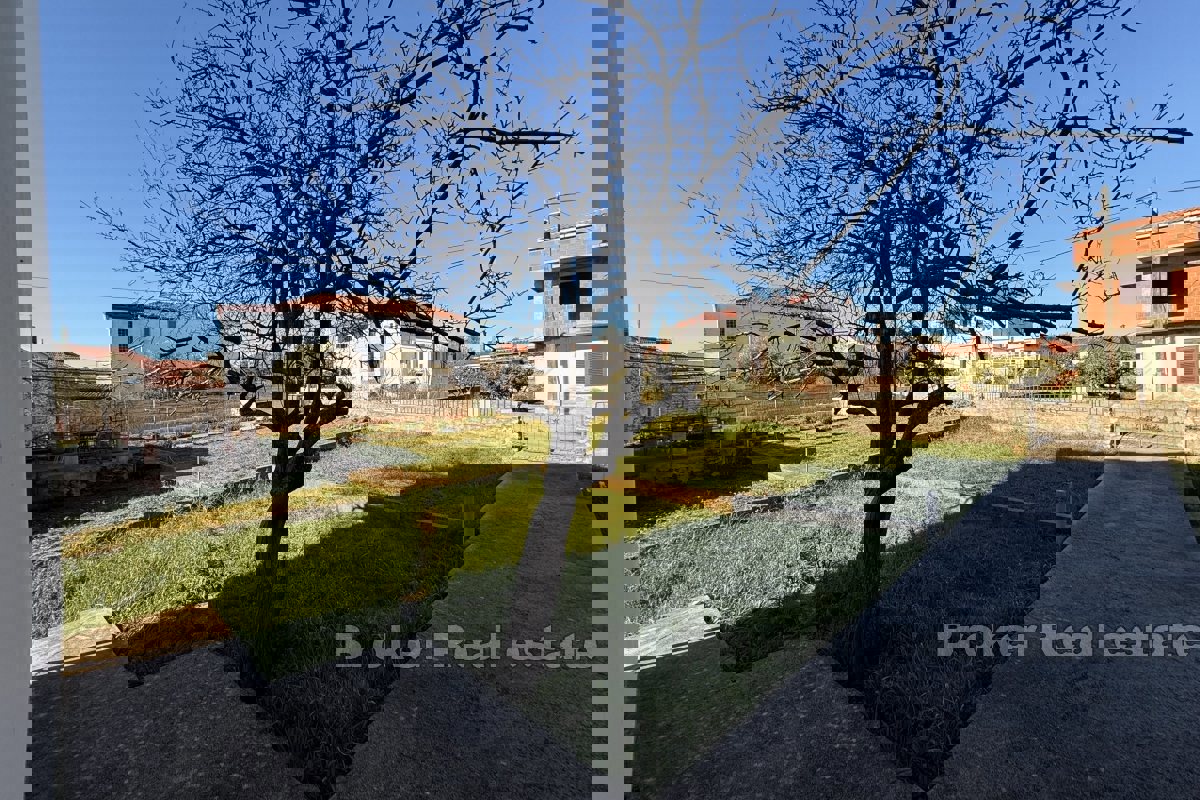 Casa nel centro della città con vista parziale sul mare