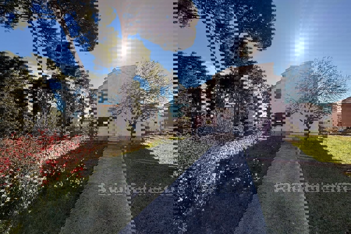 Casa nel centro della città con vista parziale sul mare