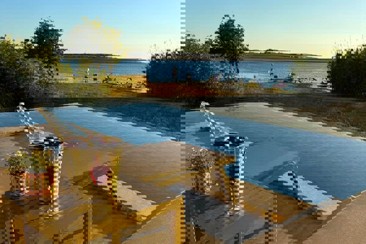 Appartamento prima fila al mare con piscina