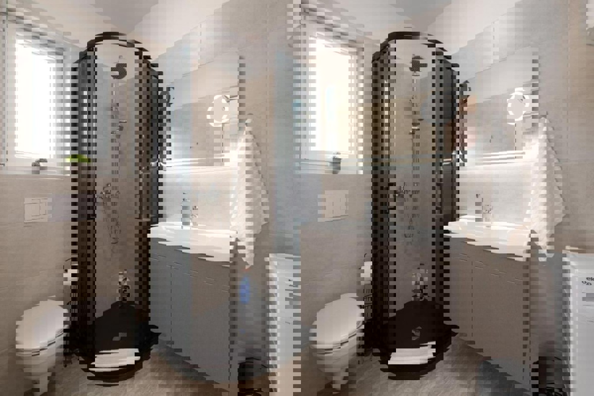 Appartamento con tre camere da letto e vista mare