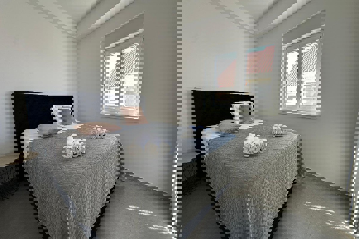 Moderno appartamento con due camere da letto in un edificio di nuova costruzione