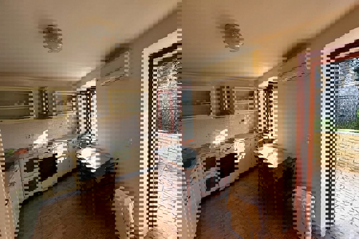 Casa bifamiliare con vista mare