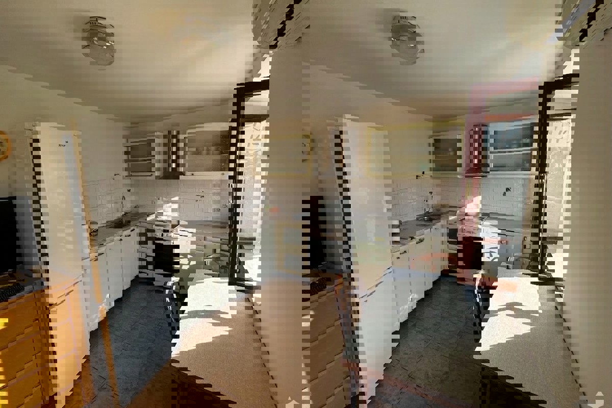 Casa bifamiliare con vista mare