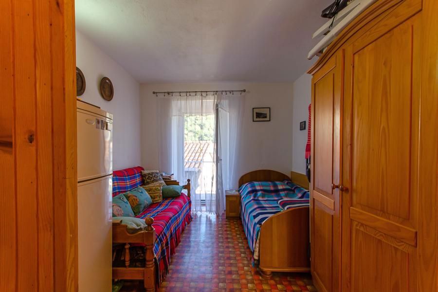 Casa in pietra sul lungomare