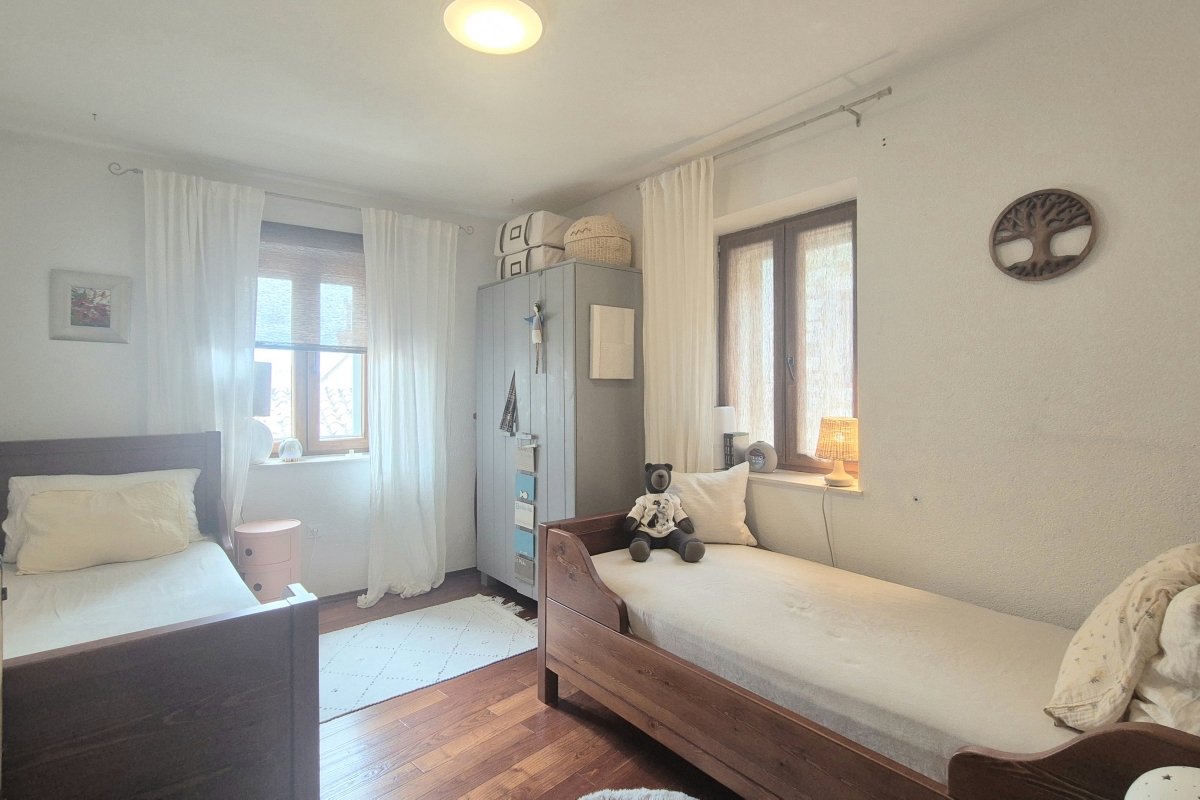 Casa in pietra in centro città con due unità abitative