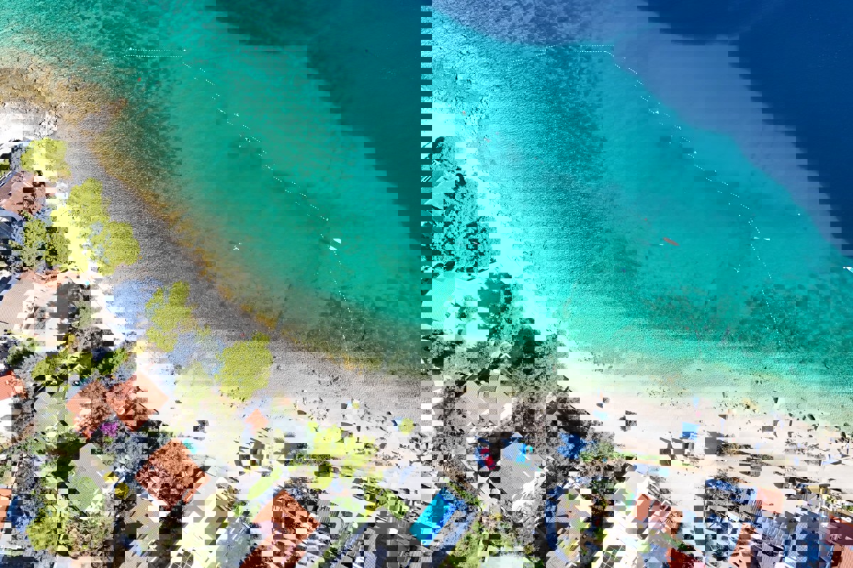 Terreno con permesso di costruire e vista mare aperta