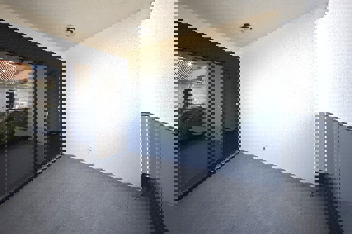 Nuova costruzione - appartamento in centro città con parcheggio, vicino al mare