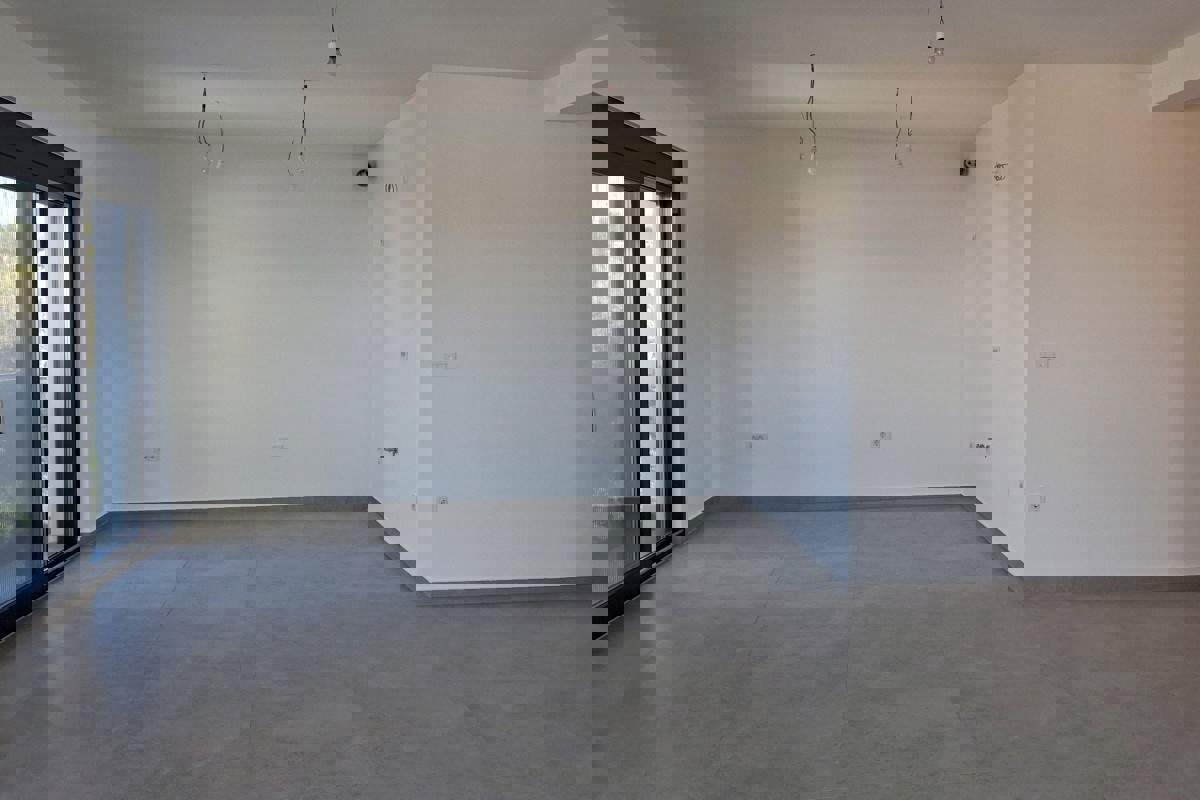 Ampio attico con vista mare aperta