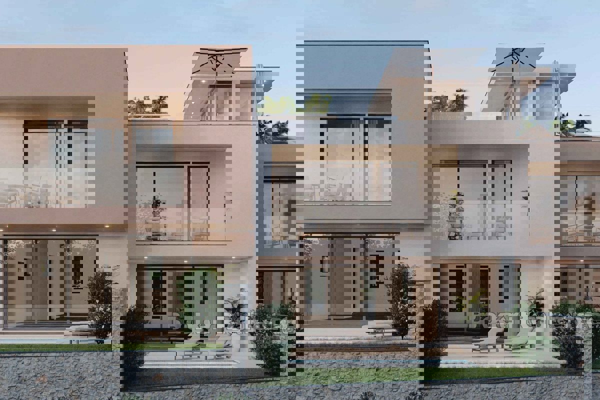 Casa di nuova costruzione in fila con vista aperta sul mare