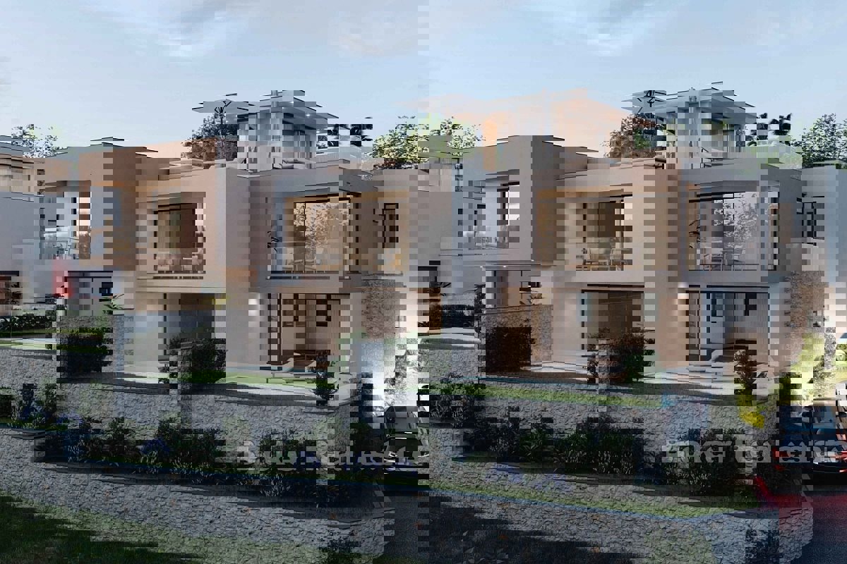 Casa di nuova costruzione in fila con vista aperta sul mare