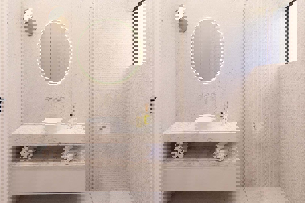 Appartamento con tre camere da letto in un edificio di nuova costruzione con vista mare