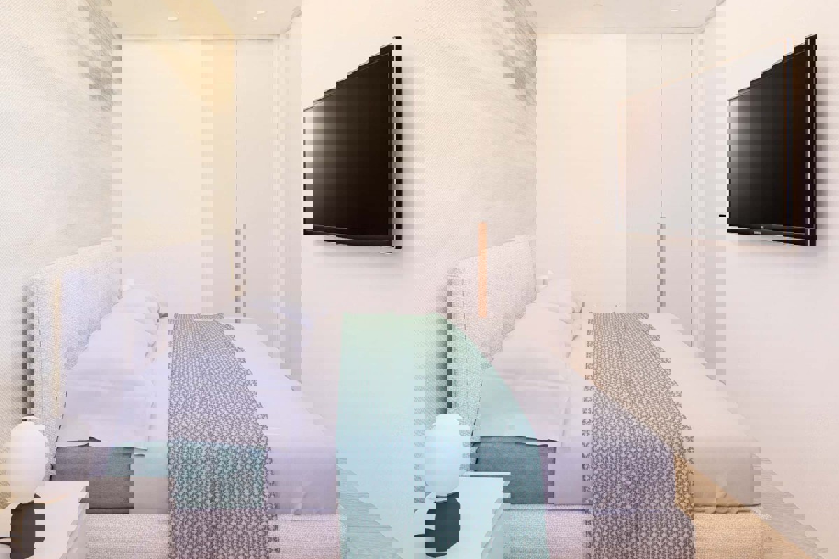 Appartamento con tre camere da letto in un edificio di nuova costruzione con vista mare