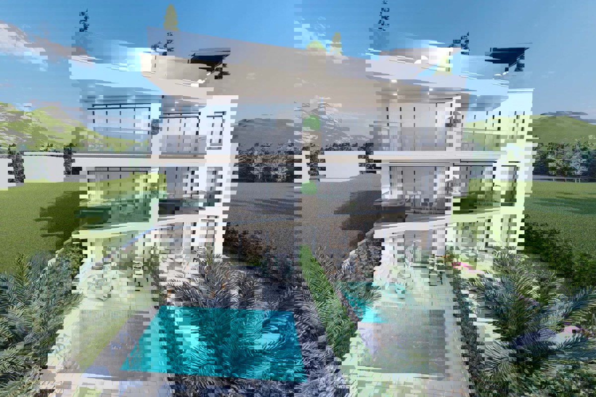 Appartamento con tre camere da letto in un edificio di nuova costruzione con vista mare