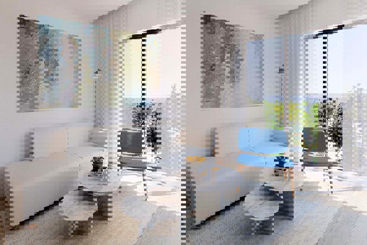 Appartamento con tre camere da letto in un edificio di nuova costruzione con vista mare